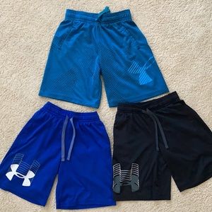 Three pairs of boys UnderArmour YSM shorts